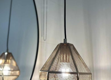 Elegant pendant lighting at Lavina Beauty in Hampton, Victoria, AU creates a serene ambiance.