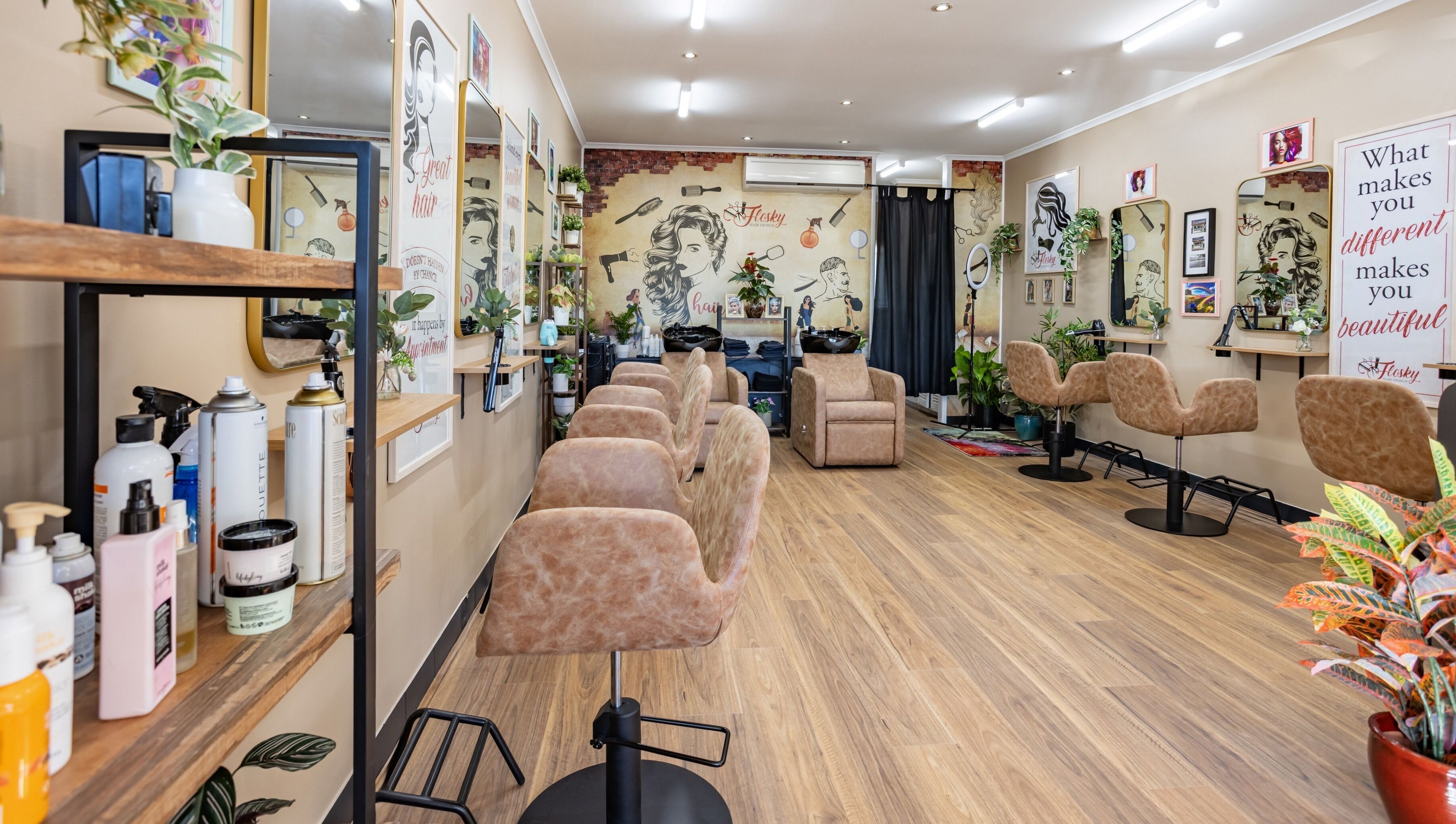 Spacious, stylish interior of Flosky Hair Design in Strathpine, Queensland, AU, featuring elegant salon chairs.