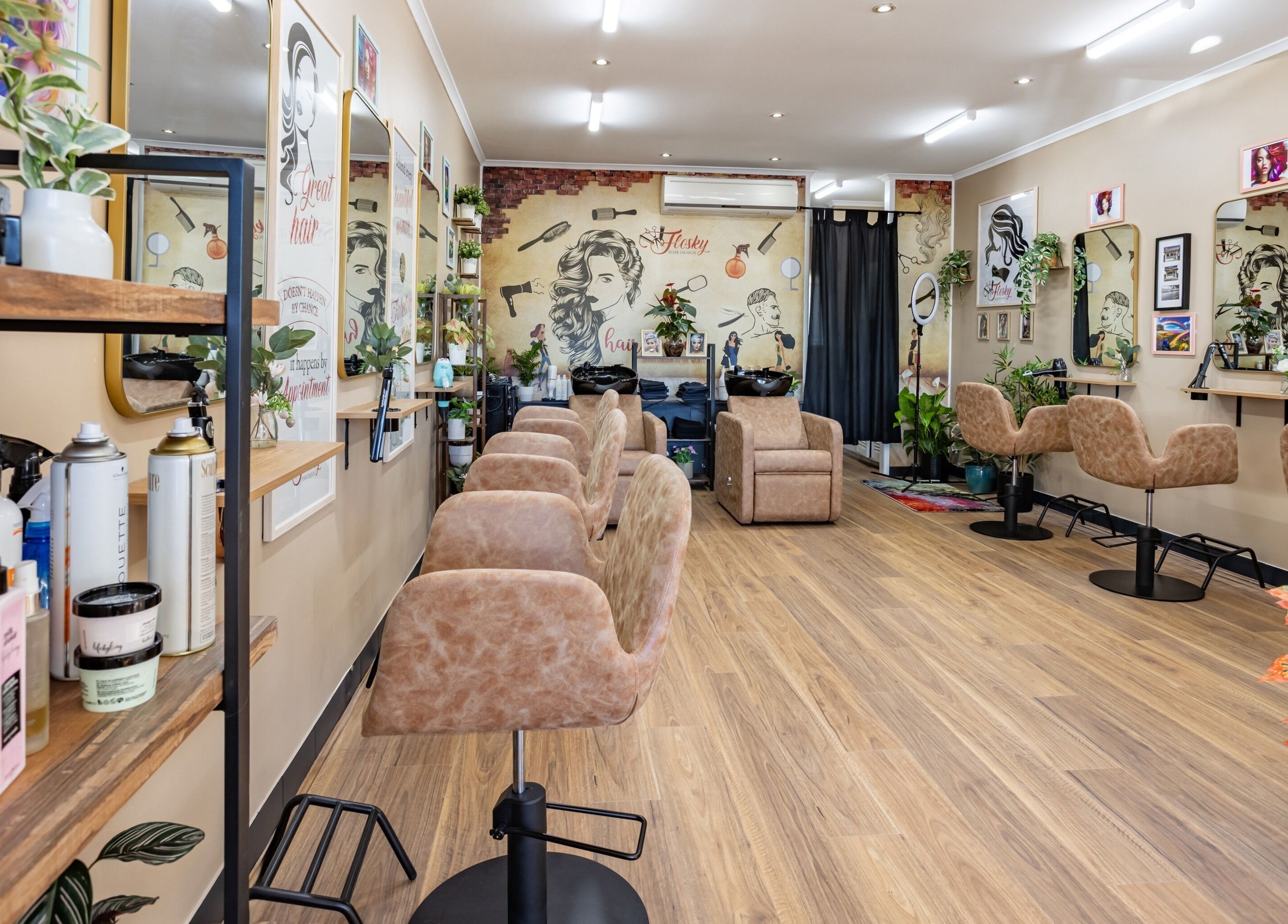 Spacious, stylish interior of Flosky Hair Design in Strathpine, Queensland, AU, featuring elegant salon chairs.