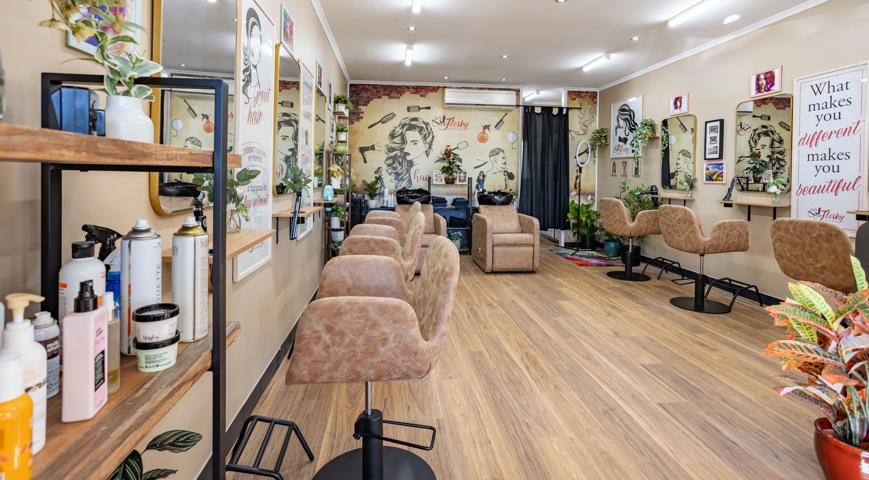 Spacious, stylish interior of Flosky Hair Design in Strathpine, Queensland, AU, featuring elegant salon chairs.