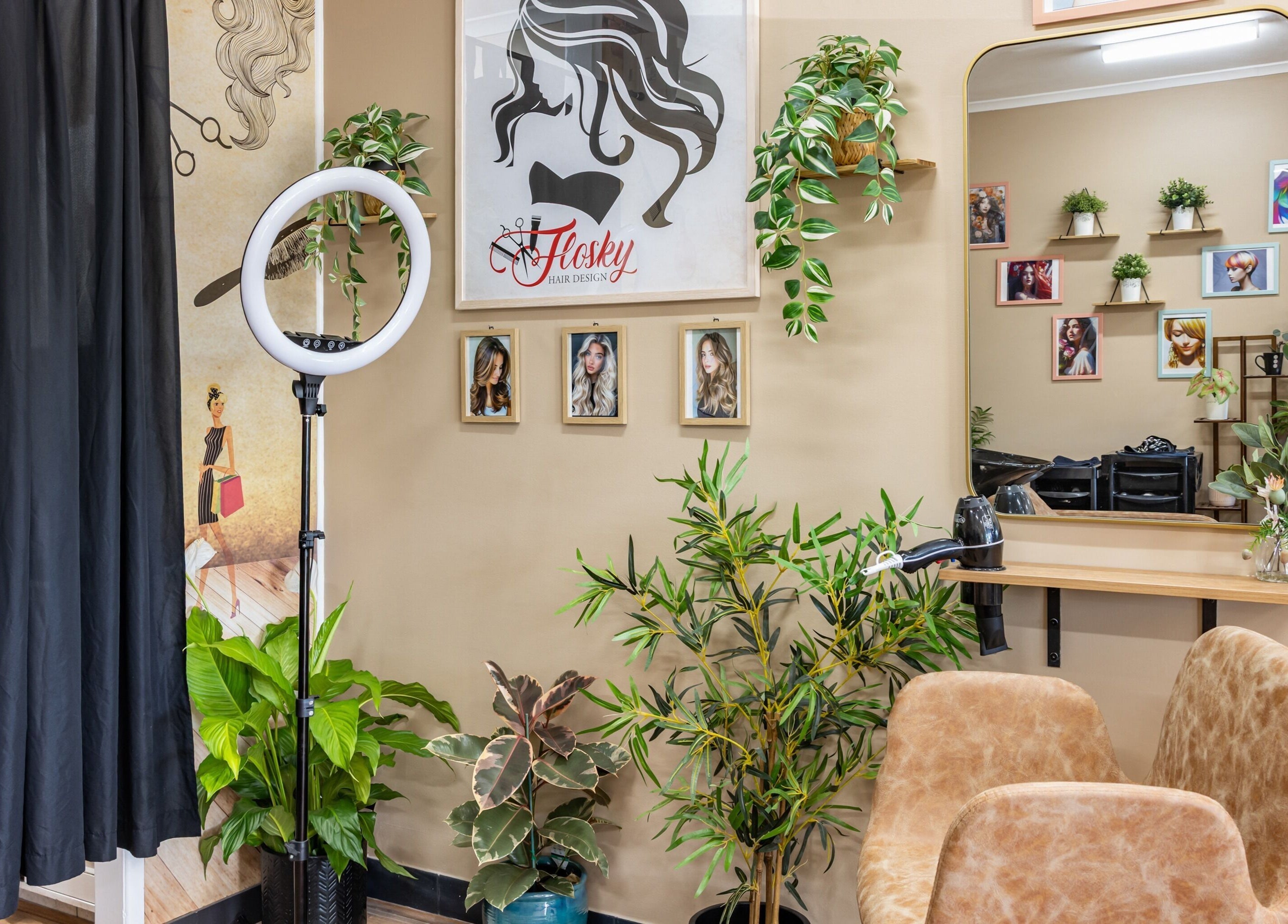 Stylish interior of Flosky Hair Design, Strathpine, Queensland, AU, showcasing modern decor and plush seating.