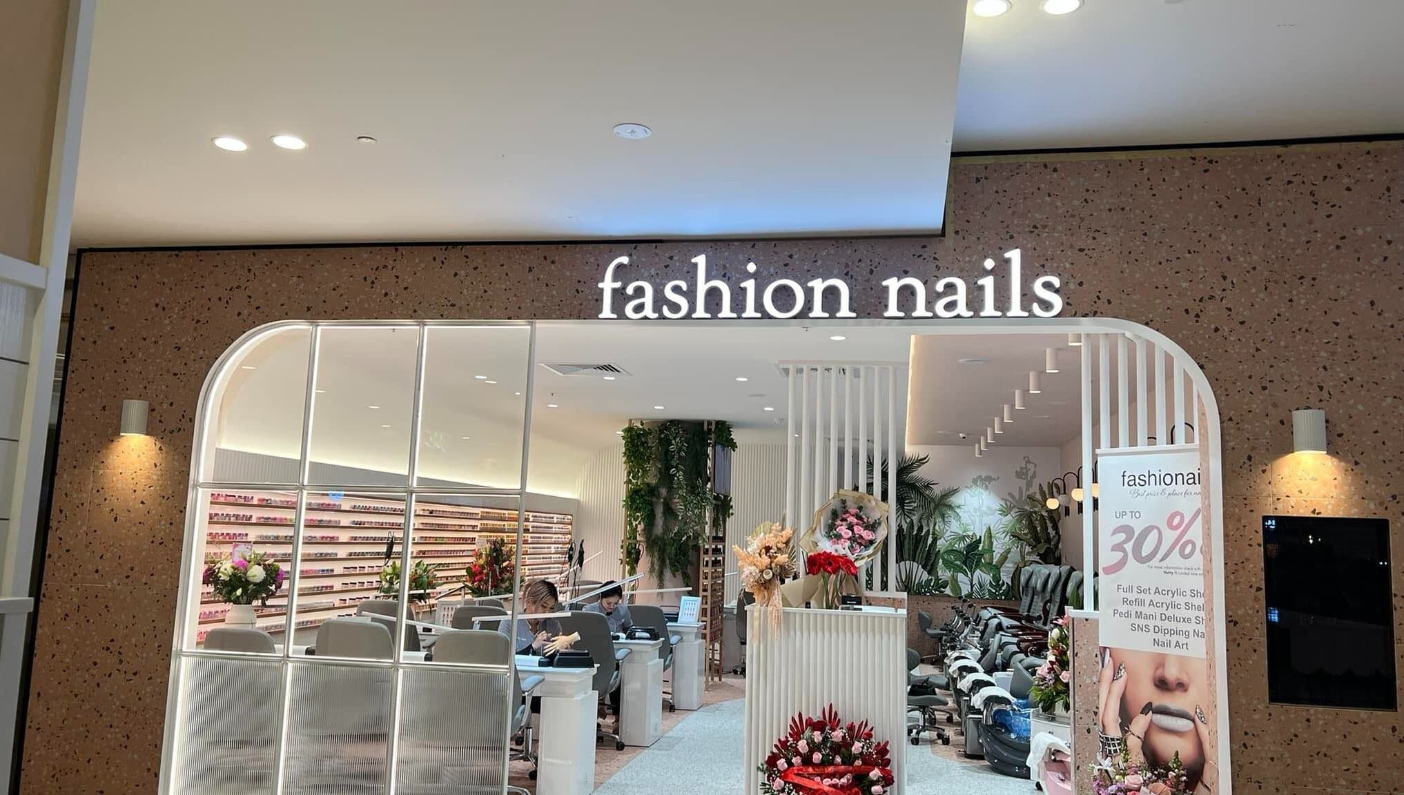 Entrance of Fashion Nails & Beauty in Oaklands Park, South Australia, showcasing modern interior and nail service stations.