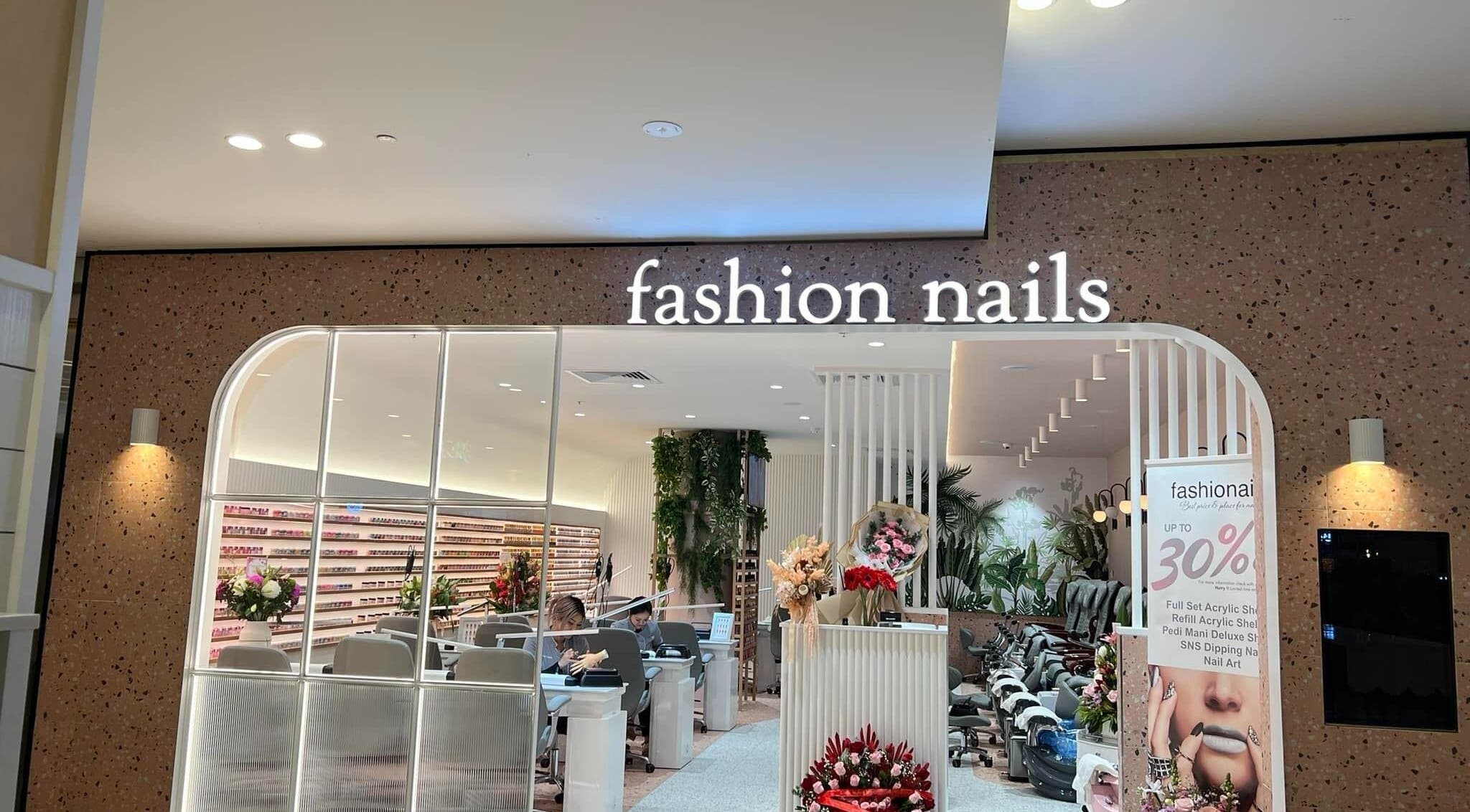 Entrance of Fashion Nails & Beauty in Oaklands Park, South Australia, showcasing modern interior and nail service stations.