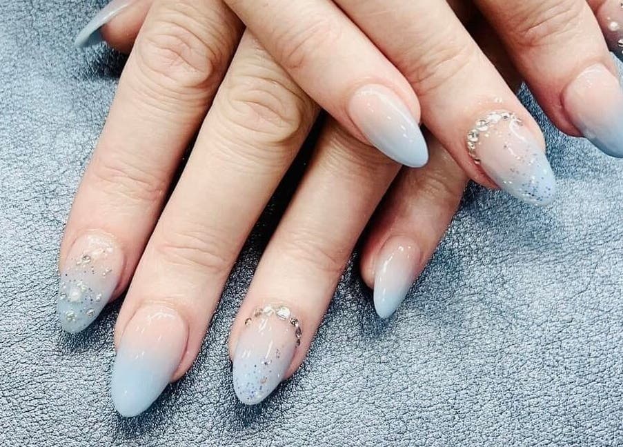 Elegant light blue nails with rhinestone design at Fashion Nails Rundle Place, Adelaide, South Australia, AU.
