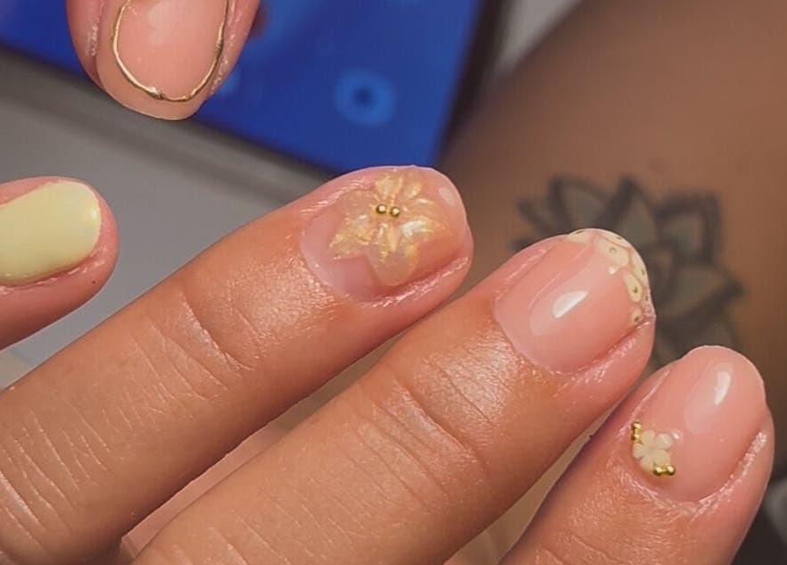 Delicate floral nail art by Glossed By Georgia in Ellington, England, GB. Perfect for elegant occasions.