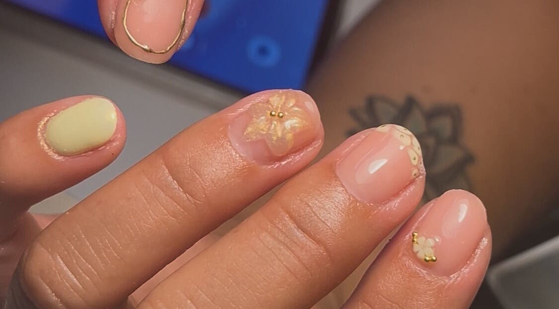 Delicate floral nail art by Glossed By Georgia in Ellington, England, GB. Perfect for elegant occasions.