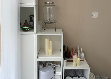 Elegant relaxation corner at Made Beauty, Nazeing, England, GB with candles and diffuser for a serene ambiance.