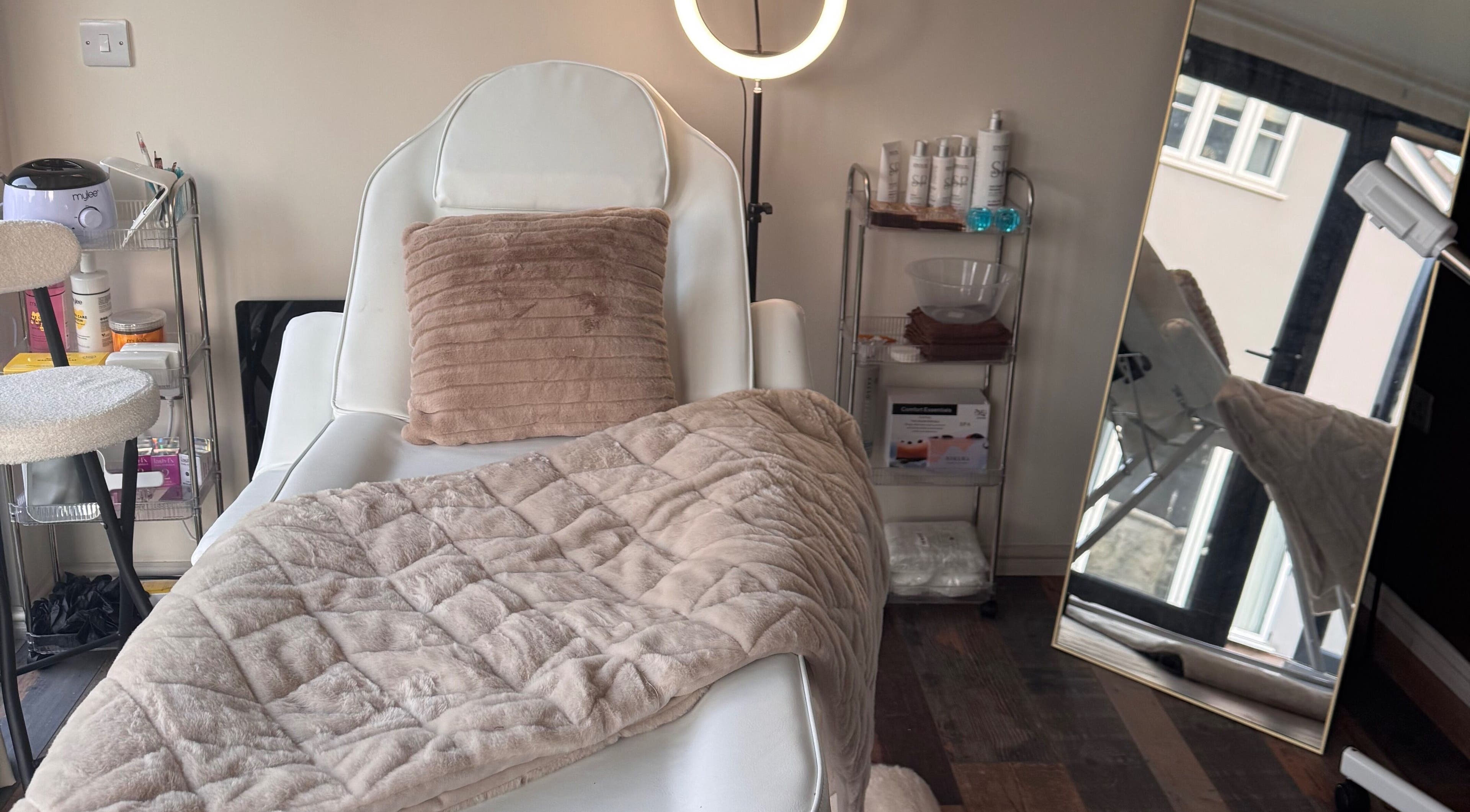 Luxurious spa chair at No.6 Beauty Lounge in Winterbourne, England, GB, offering a soothing retreat.