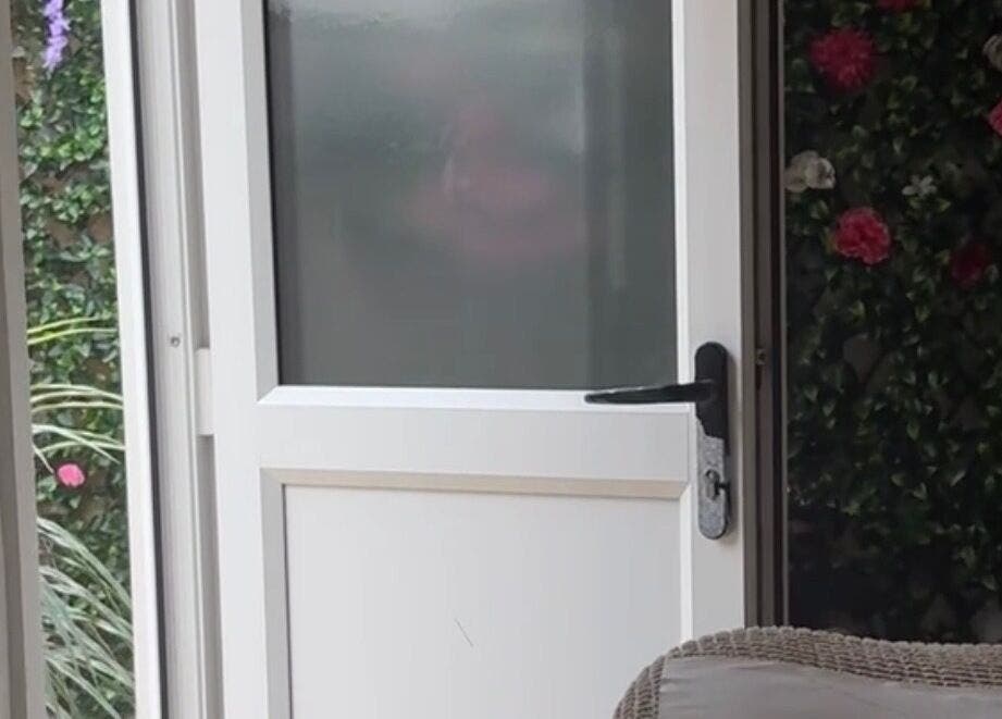 Inviting door with floral decor at Pampered@62 in Blackpool, England, GB enhances serene ambiance.