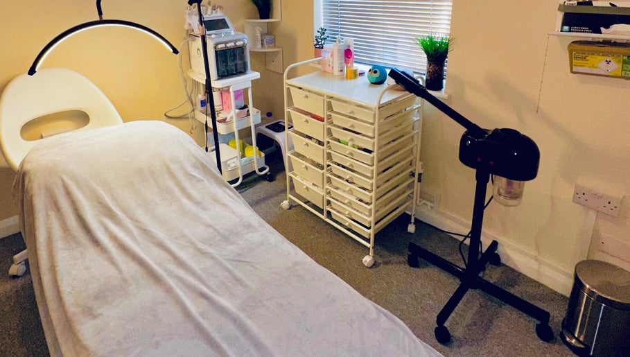 Cozy treatment room at Esthora Aesthetics in London, England, GB equipped for beauty and wellness services.