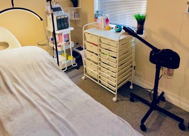 Cozy treatment room at Esthora Aesthetics in London, England, GB equipped for beauty and wellness services.