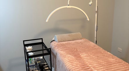 Relaxing treatment bed at Eyes by Em in Greenfields, Western Australia, AU, ready for a beauty session.
