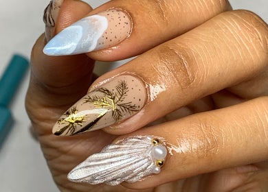Elegant nail art at OnHer by Melissa Studio, Trincity, featuring unique designs on well-manicured nails.