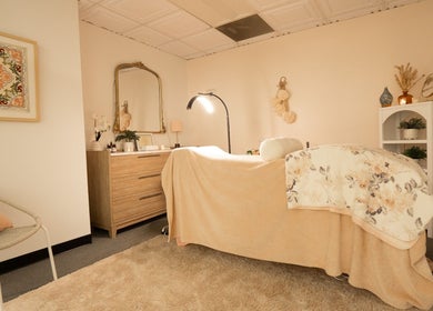 Tranquil treatment room at PRECISION LASH & BROW in Bethesda, Maryland, US, featuring cozy decor.