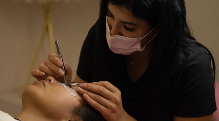 Expert eyelash application at PRECISION LASH & BROW, Bethesda, Maryland, US by a skilled technician.