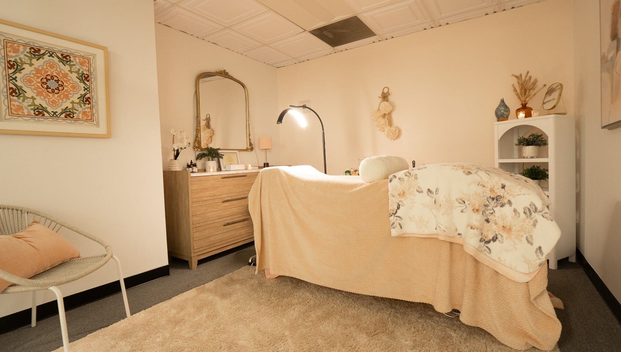 Elegant treatment room at PRECISION LASH & BROW in Bethesda, Maryland, US with warm lighting and cozy decor.