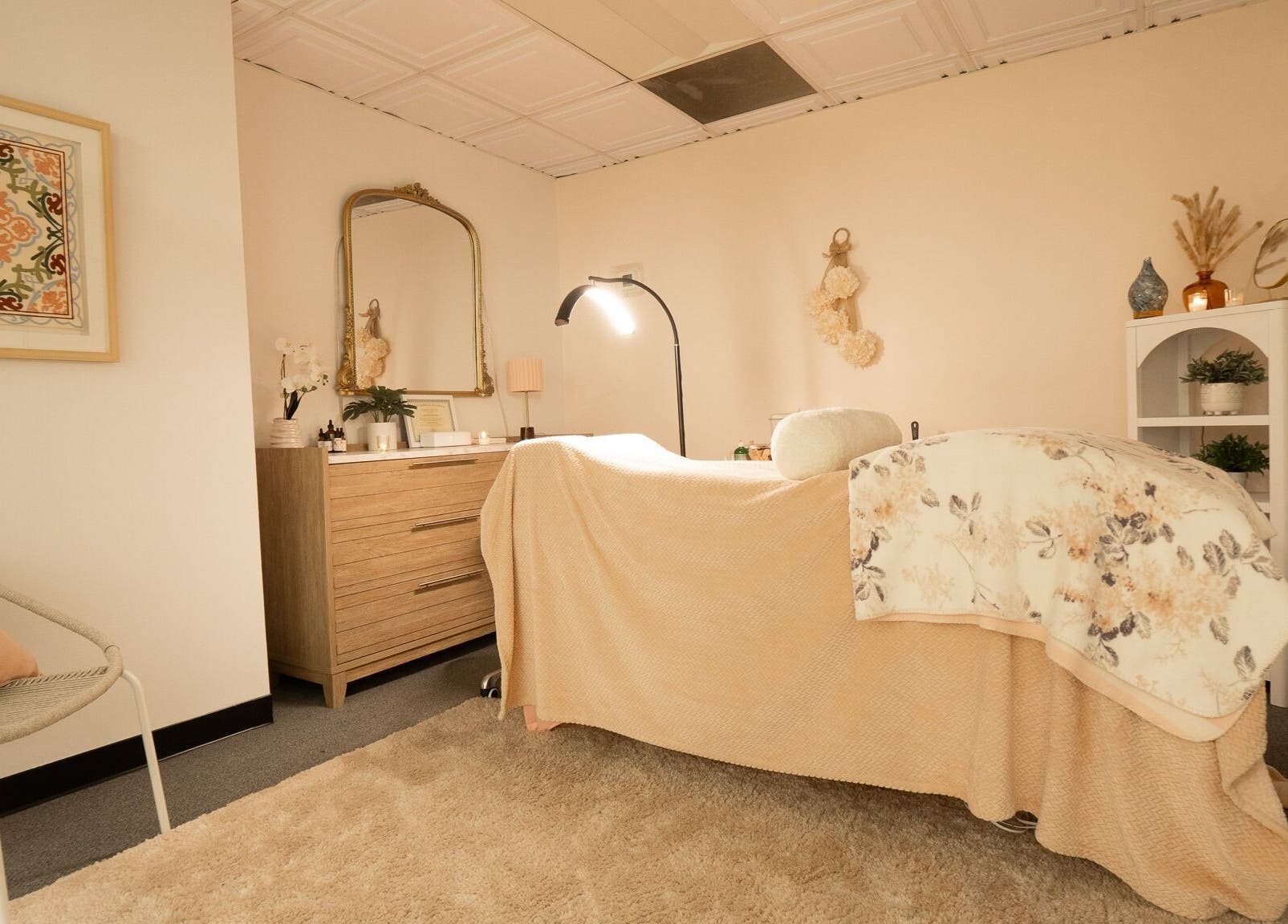 Elegant treatment room at PRECISION LASH & BROW in Bethesda, Maryland, US with warm lighting and cozy decor.