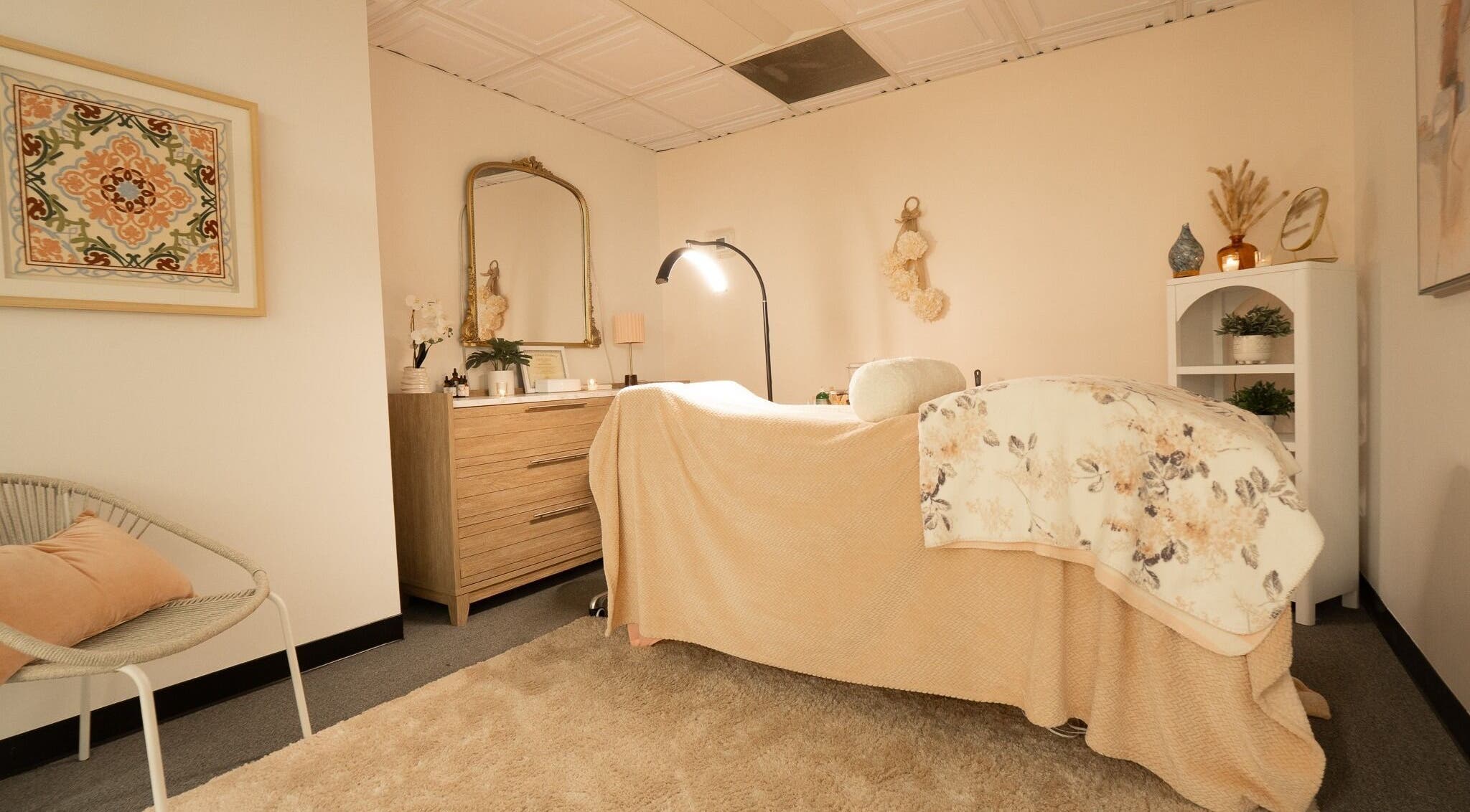 Elegant treatment room at PRECISION LASH & BROW in Bethesda, Maryland, US with warm lighting and cozy decor.