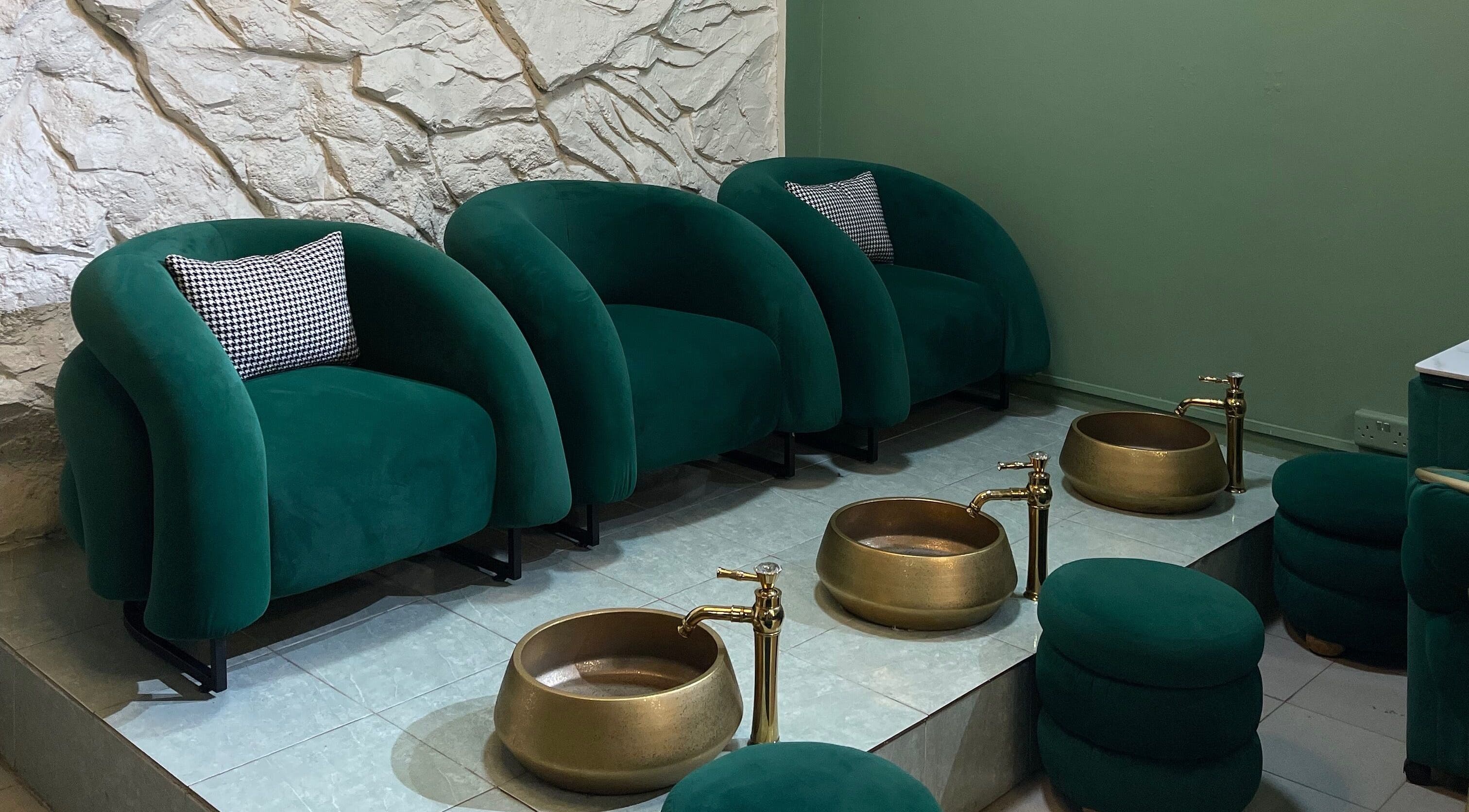 Luxurious green velvet chairs at SHY KAMPALA BY MB, Kampala, Central Region, UG, ideal for relaxation.
