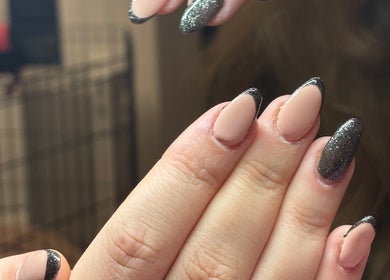 Elegant manicure with glitter tips at Blissa Beauty Tattoo & SPMU, Bridlington, England, GB.