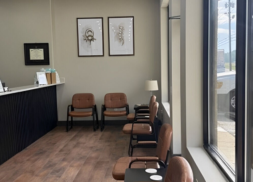 Inviting waiting area at Ashley Durbin, LMT - Vonore in Vonore, Tennessee, US with chairs and natural light.