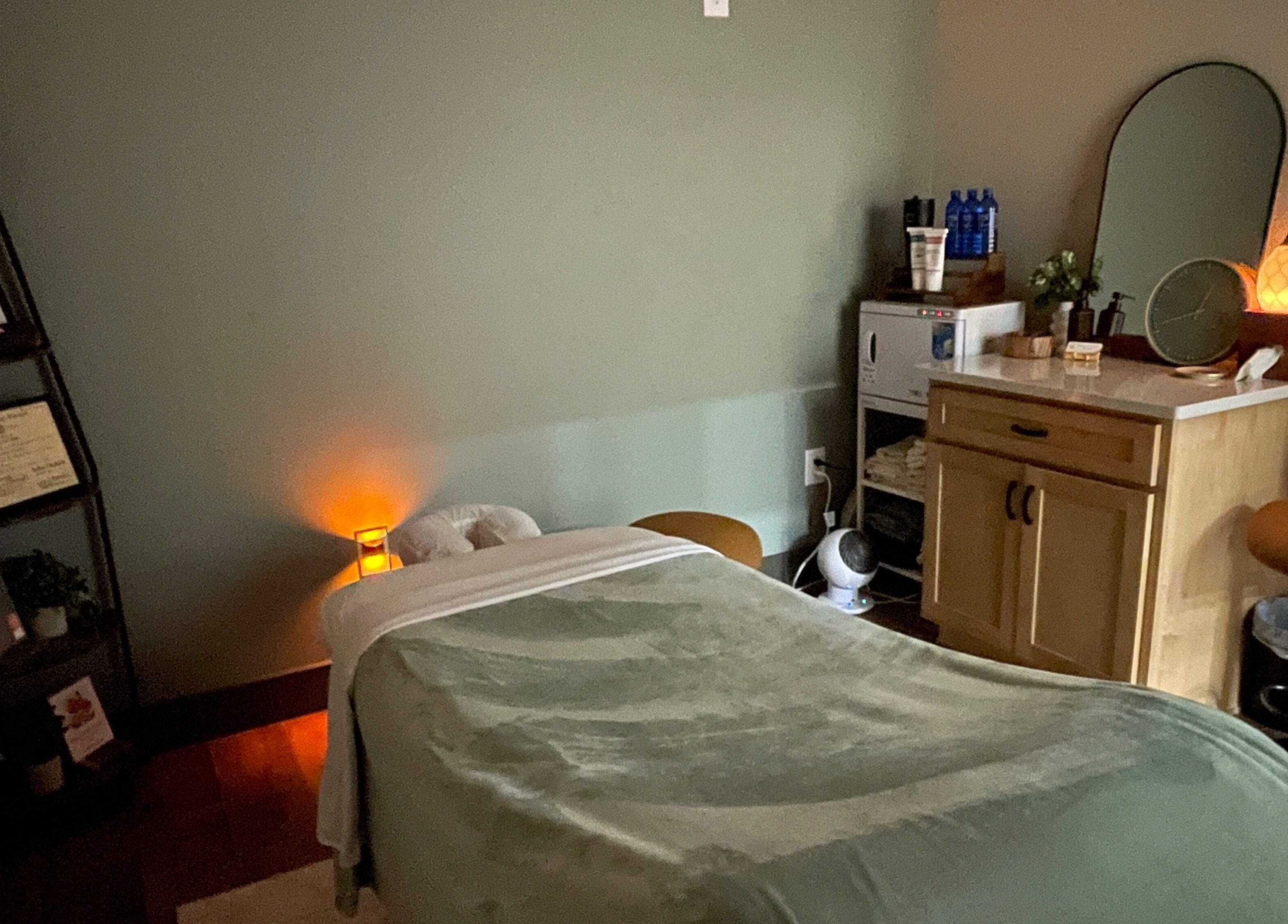 Cozy massage room at Ashley Durbin, LMT - Vonore in Vonore, Tennessee, US with soft lighting and a massage table.