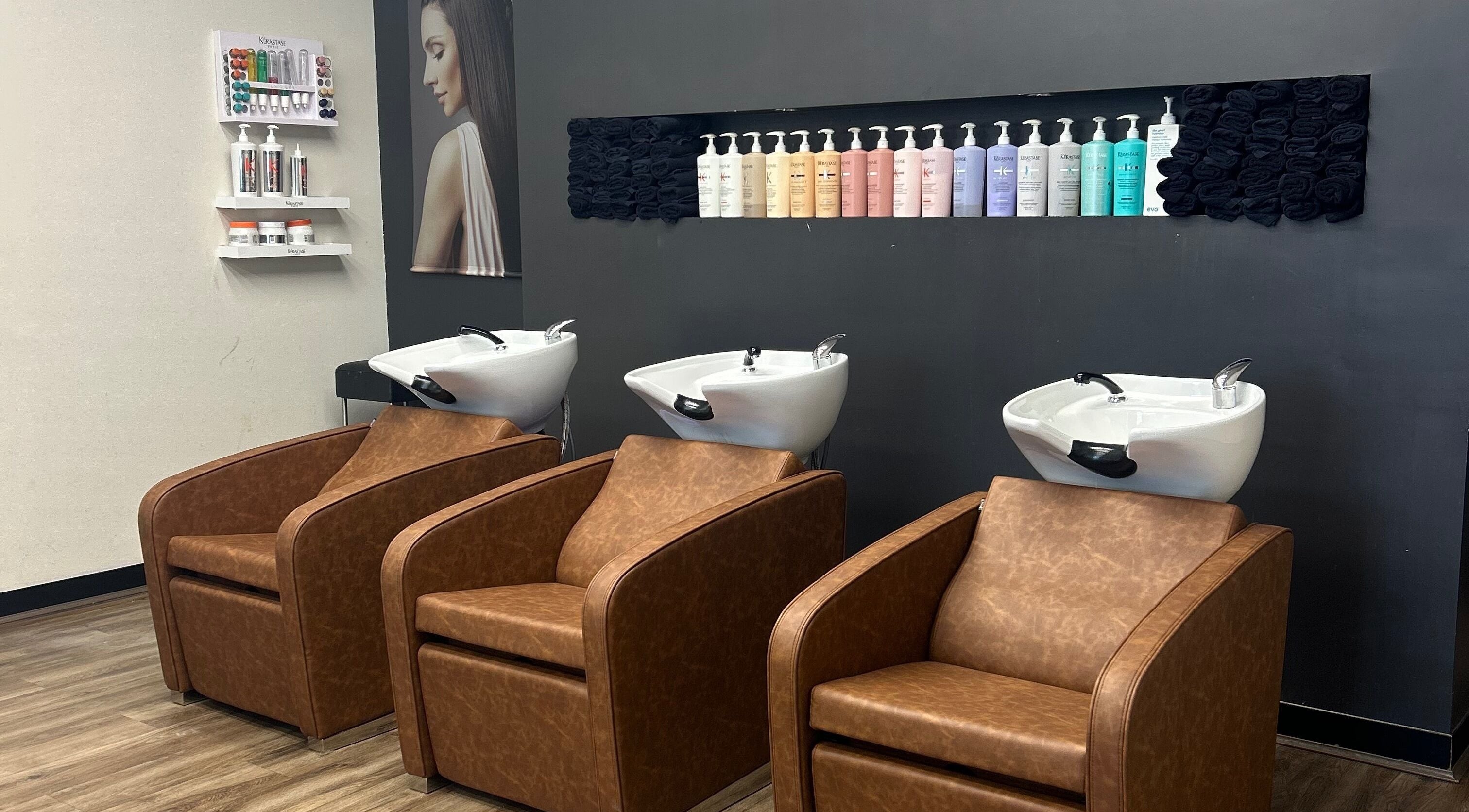 Elegant wash stations at Ritz Hair Studio, Bicton, Western Australia, AU showcasing premium hair care products.