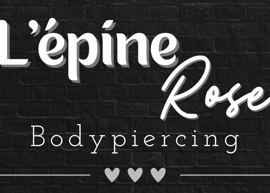 Logo lumineux de L’épine rose | Piercing à Bruille-saint-amand, Hauts-de-france, FR sur fond noir.
