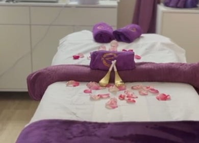 Elegant massage bed with rose petals at Ur Beauty Oasis, Royal Tunbridge Wells, England, GB.