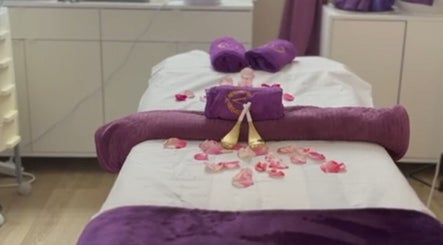 Elegant massage bed with rose petals at Ur Beauty Oasis, Royal Tunbridge Wells, England, GB.