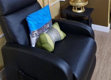 Comfortable black massage chair at Ying Yang Thai Massage in Aberdeen, Scotland, GB.