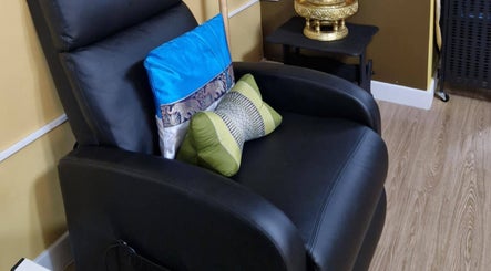 Comfortable black massage chair at Ying Yang Thai Massage in Aberdeen, Scotland, GB.