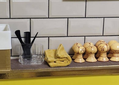 Elegant decor at Ying Yang Thai Massage in Aberdeen, Scotland, GB, featuring wooden ornaments and towels.