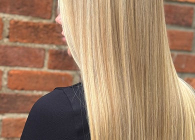 Straight blonde hair showcased at At home with Jade, Lincoln, England, GB.