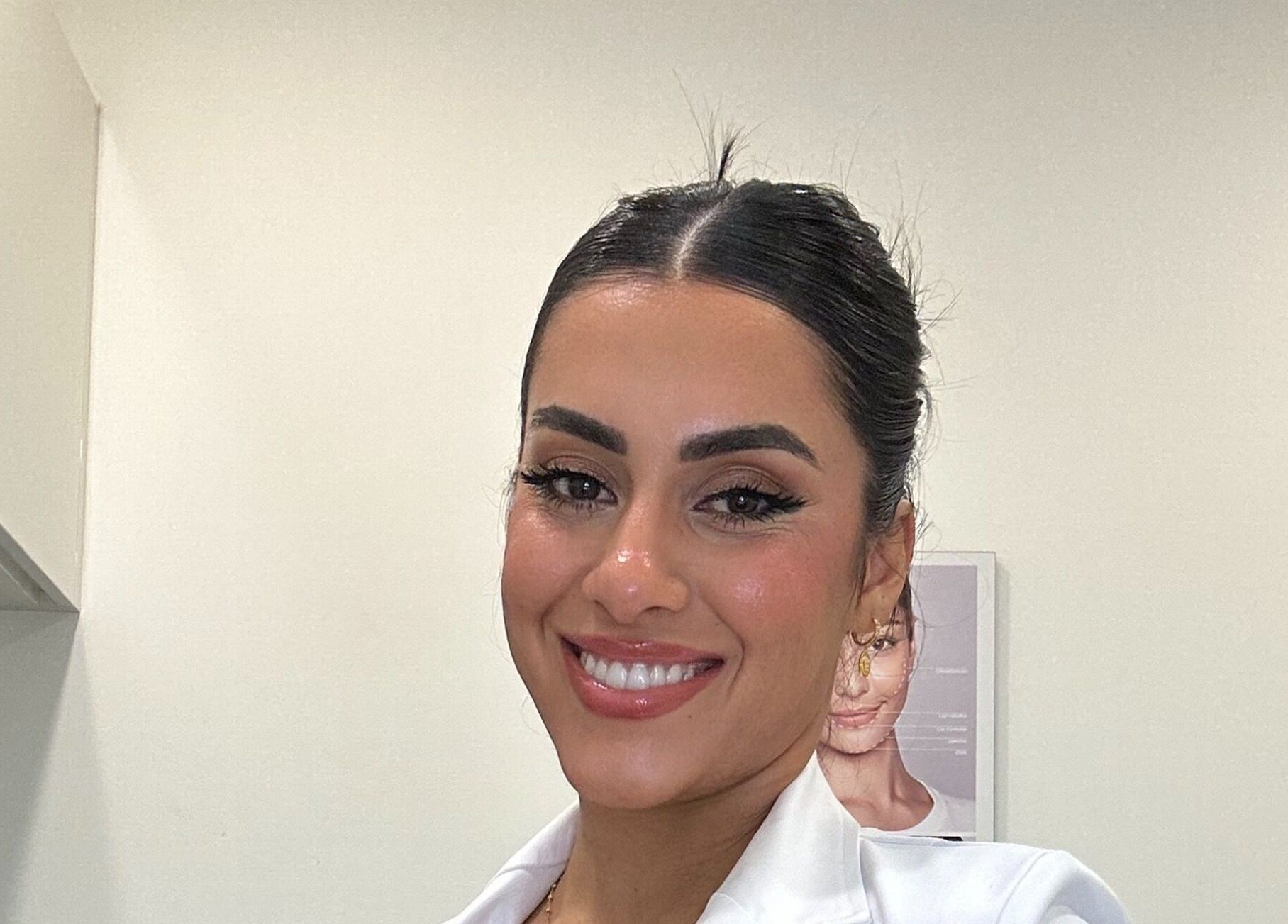 Beauty professional smiling at Routine Contour Clinic- Hillside, Melbourne, Victoria, AU.