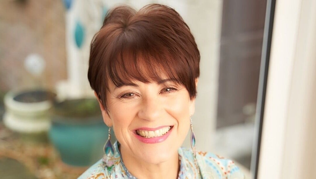 Smiling individual at HealthyMindandSoul, a beauty and wellness venue in Stourbridge, England, GB.