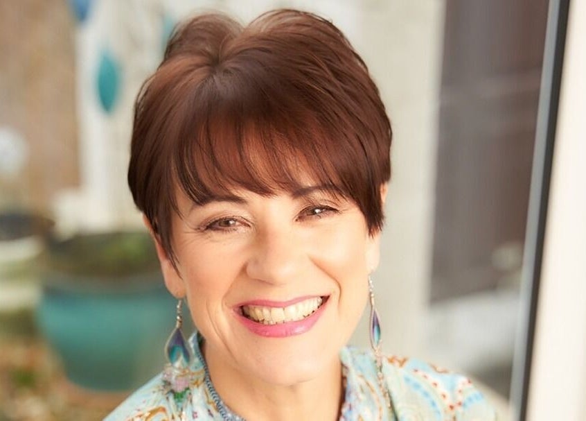 Smiling individual at HealthyMindandSoul, a beauty and wellness venue in Stourbridge, England, GB.