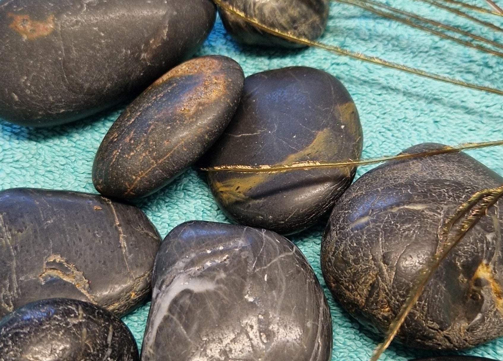 Relaxing hot stones at HealthyMindandSoul spa in Stourbridge, England, GB for rejuvenating wellness treatments.