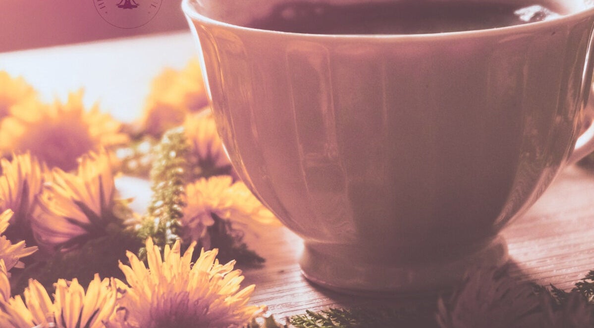 Warm tea surrounded by flowers at HealthyMindandSoul, Stourbridge, England, GB, creating a calming ambiance.