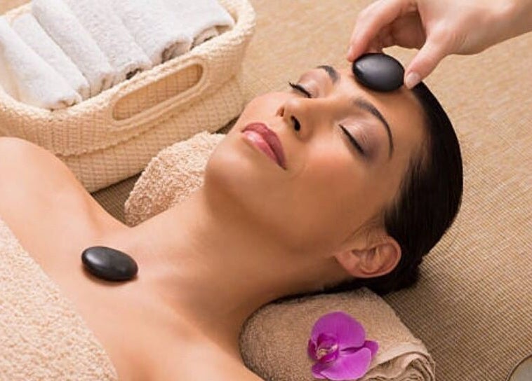 Relaxing hot stone therapy at HealthyMindandSoul, Stourbridge, England, GB. Enjoy soothing wellness experiences.