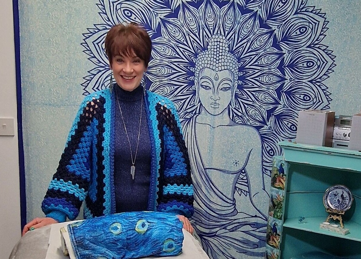 Cozy room at HealthyMindandSoul in Stourbridge, England, GB, featuring a calming Buddha tapestry.