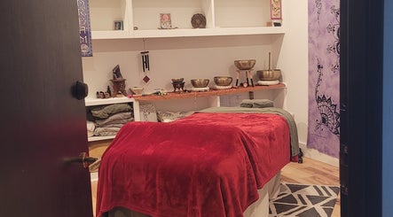 Tranquil massage room at Playground For The Soul, Winston-salem, North Carolina, US, with calming decor.