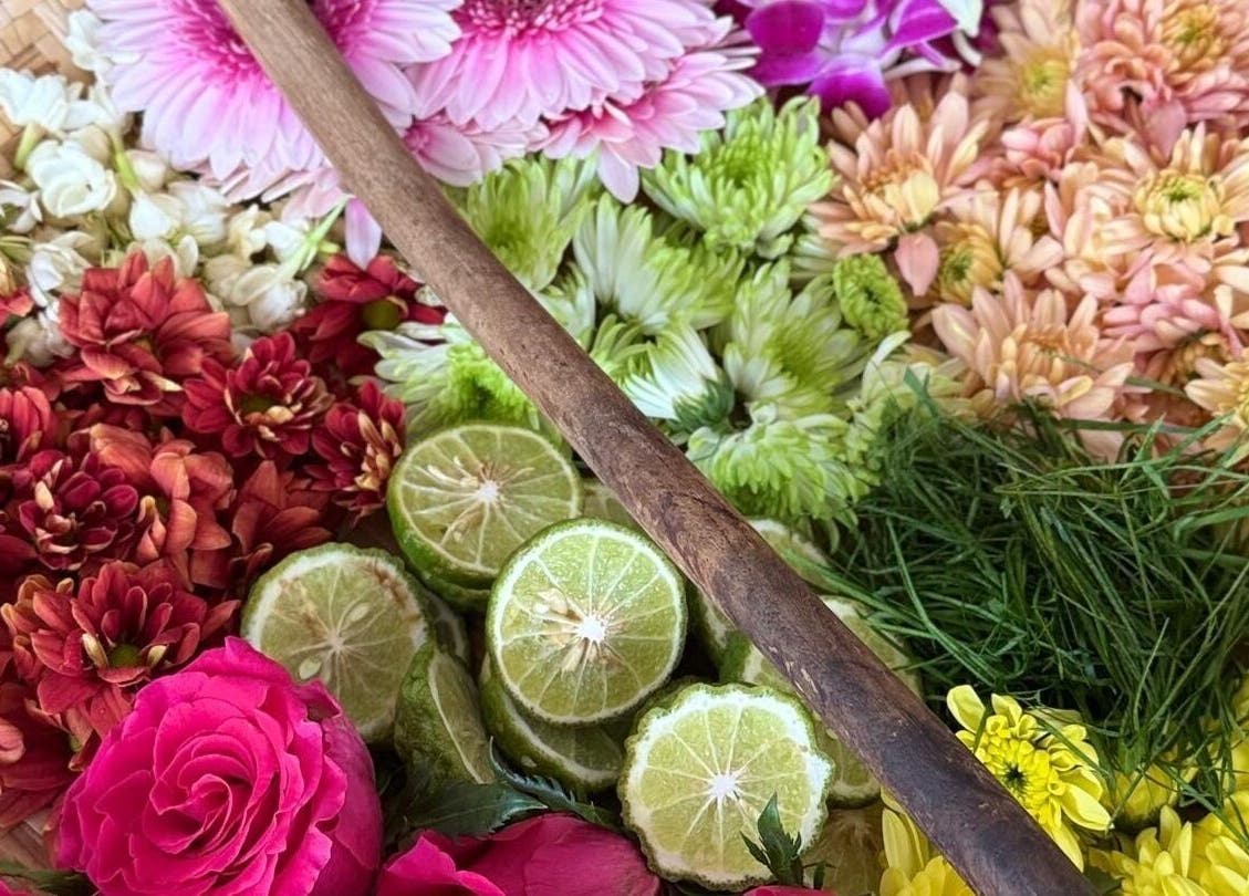 Vibrant flowers and sliced limes at Rainoura by Nurain Firdaus, Rawang, Selangor, MY enhancing wellness.