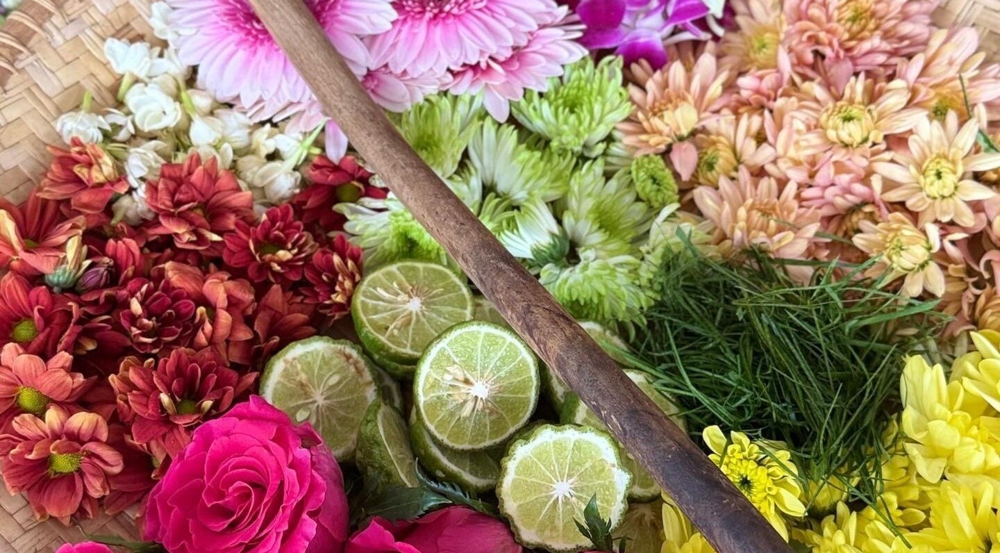 Vibrant flowers and sliced limes at Rainoura by Nurain Firdaus, Rawang, Selangor, MY enhancing wellness.