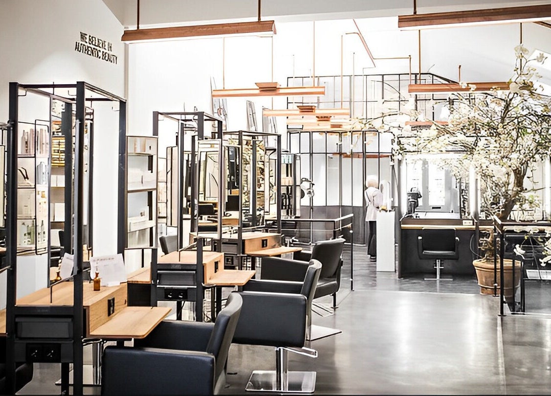 Stylish interior of Mogeen beauty salon in Amsterdam, Noord-Holland, NL with sleek design and lighting.