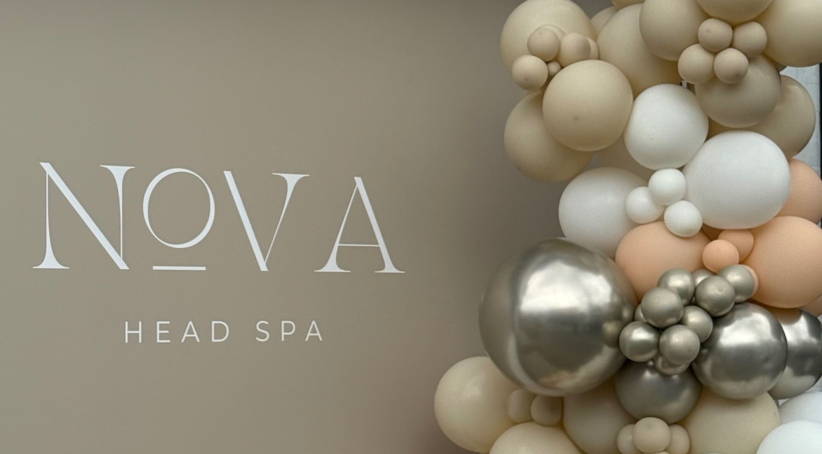 Nova Head Spa Sutton England GB with elegant balloon decor in neutral tones for a grand opening.