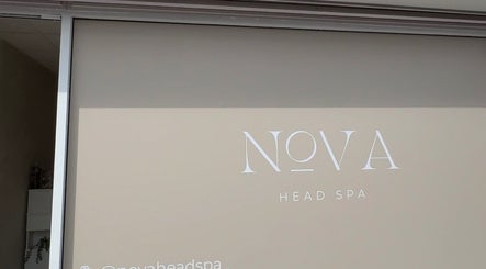 Sign of Nova Head Spa in Sutton, England, GB showcasing elegant spa entrance.