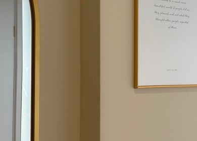 Stylish wall decor and mirror at Nova Head Spa, Sutton, England, GB. Elegant ambiance for wellness.