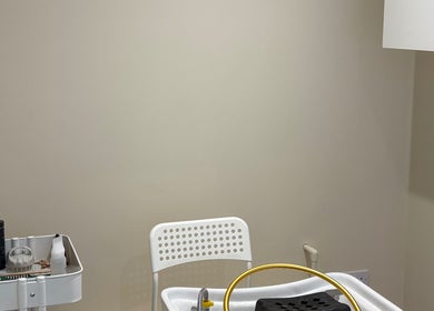 Nova Head Spa wash station with white chair and basin, Sutton, England, GB.