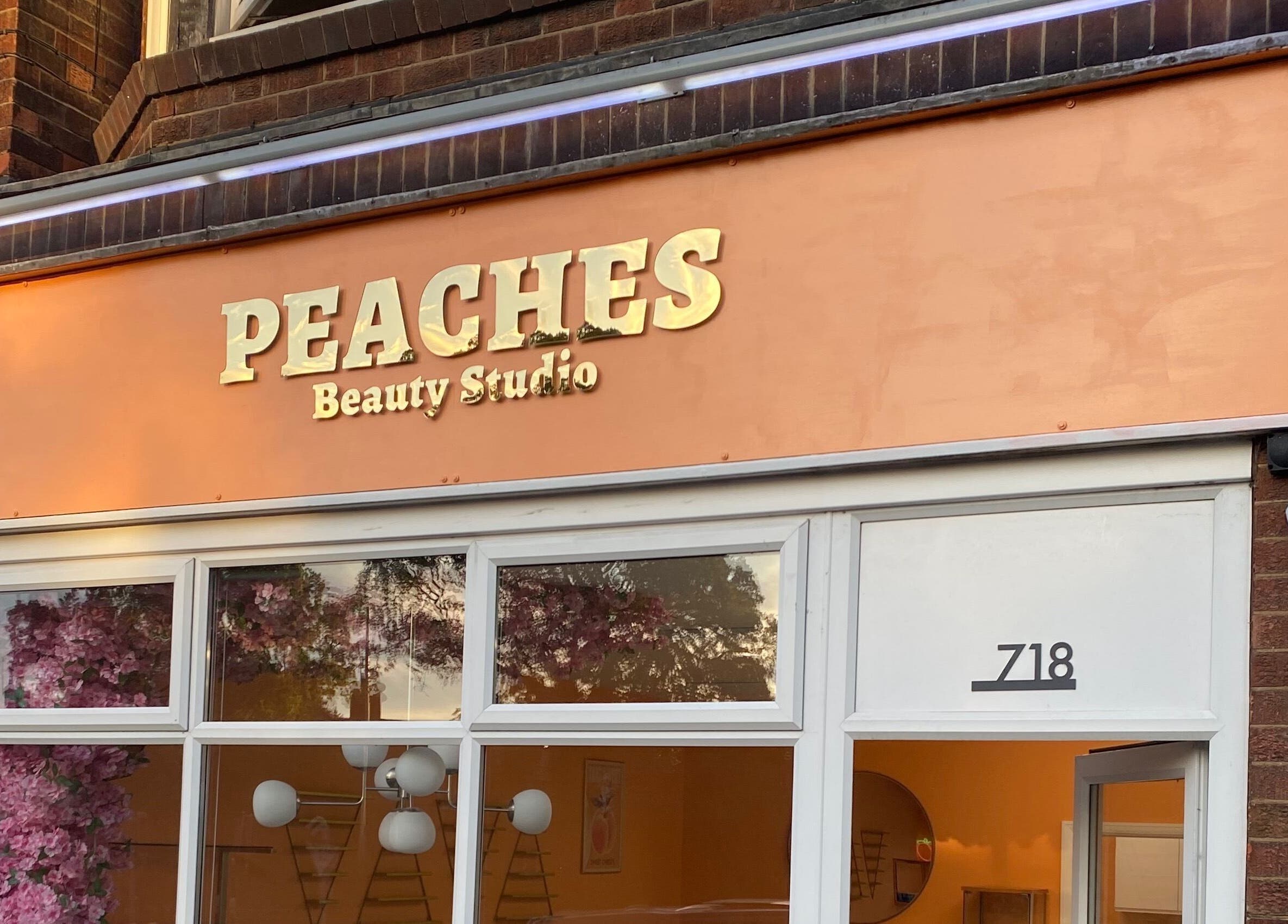 Peaches Beauty Studio exterior with gold lettering, Nottingham, England, GB.